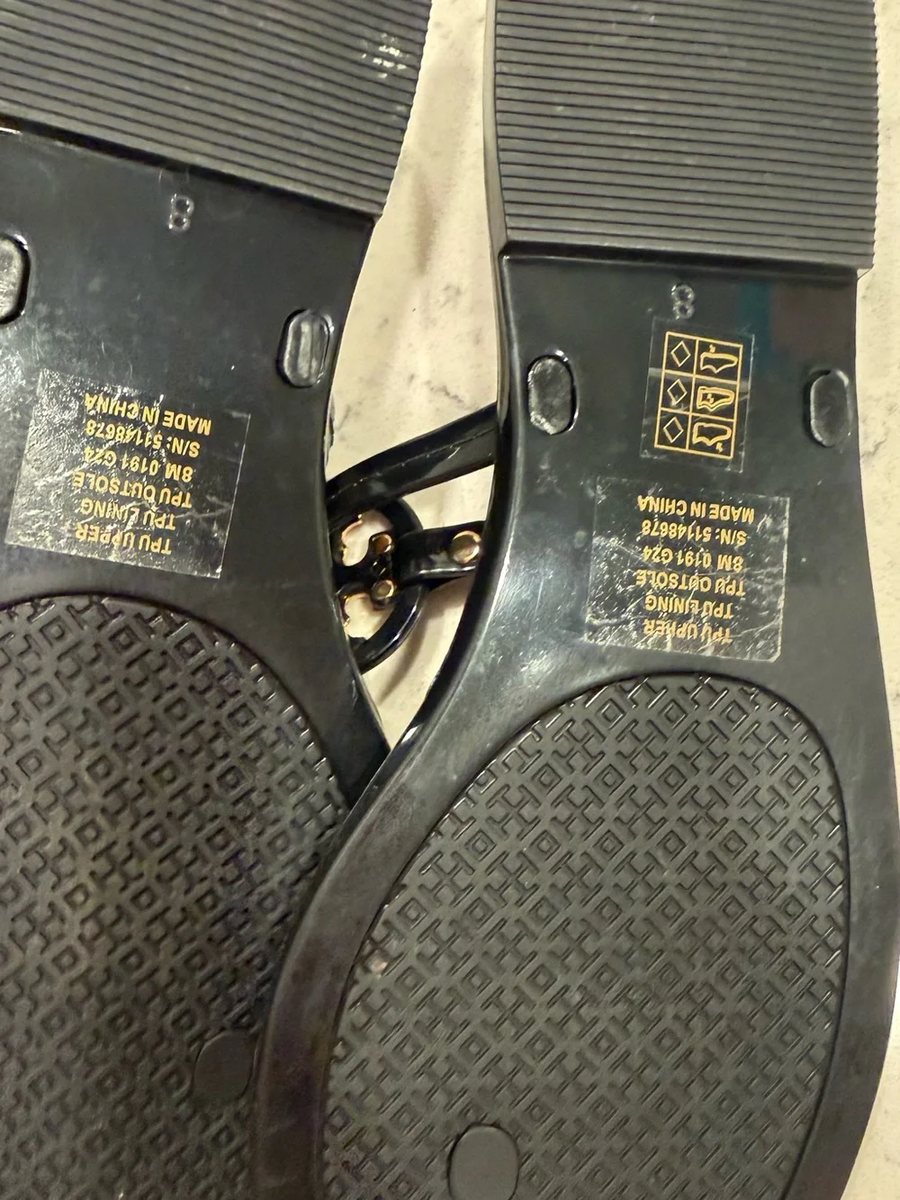 Tory Burch Black Jelly Thong Sandals with Gold Logo